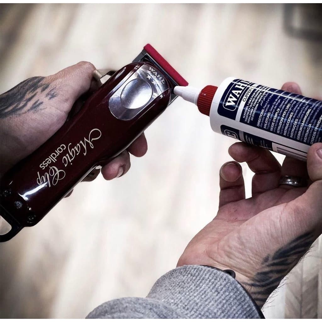 แท้ น้ำมันจักร หยอด ปัตตาเลียน WAHL clipper oil 60ml น้ำมัน แบตตาเลี่ยน USA สำหรับรักษาใบมีดให้คม น้ำมันใส หล่อลื่น รูปที่ 4