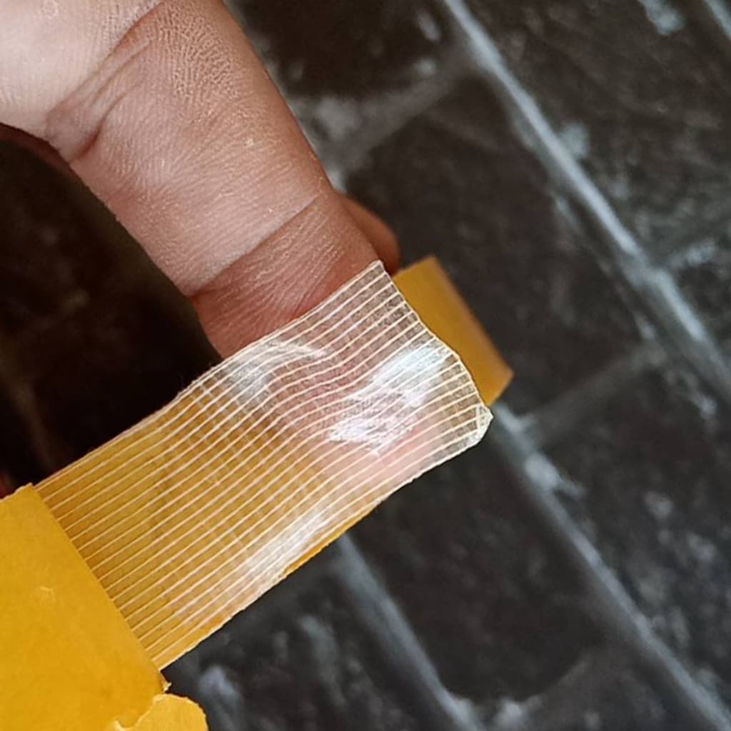 เทปกาว 2 หน้า ขนาด 1.8 CM * 50 M เนื้อตะข่ายต่อไวนิล ติดยึดพรมและวัสดุอื่นๆได้ เหนียว ยอดนิยม สุดคุ้ม รูปที่ 3