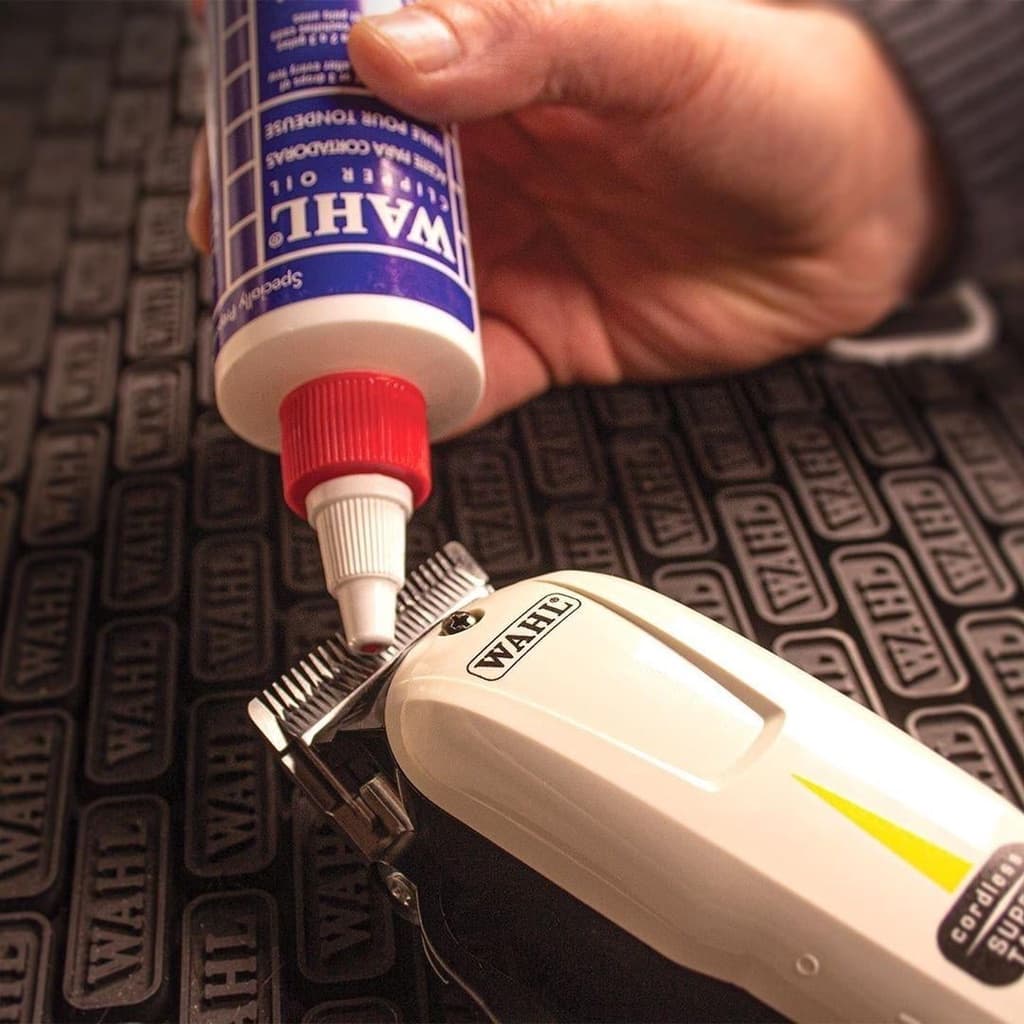 แท้ น้ำมันจักร หยอด ปัตตาเลียน WAHL clipper oil 60ml น้ำมัน แบตตาเลี่ยน USA สำหรับรักษาใบมีดให้คม น้ำมันใส หล่อลื่น รูปที่ 7