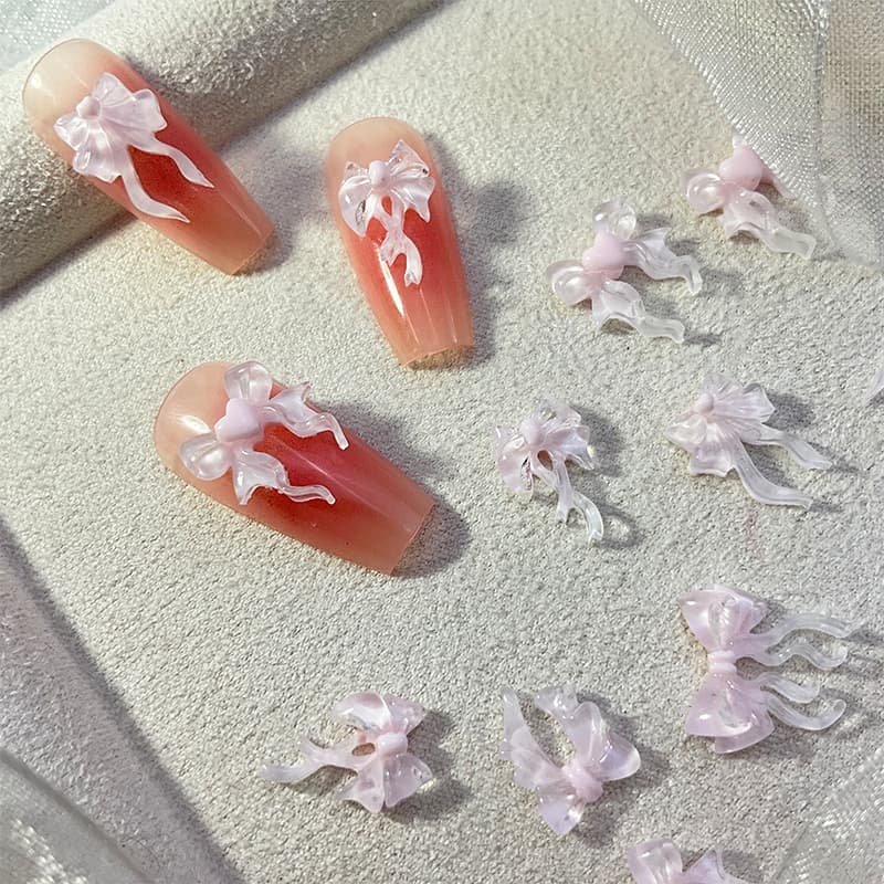 Rou Bao 50 ชิ้นเล็บสีชมพูโปร่งใสโบว์ริบบิ้น Girly ความงามผสมเล็บเรซิ่น Art DIY Charms ตกแต่ง รูปที่ 4