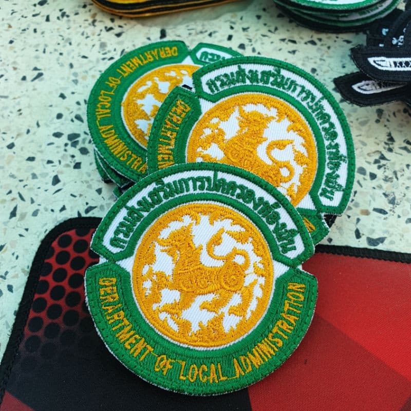 อาร์มติดเสื้อตีนตุ๊กแก กรมส่งเสริมการปกครองท้องถิ่น
