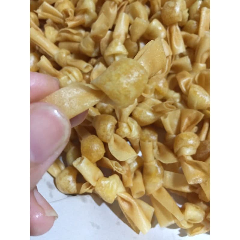 ขนมผูกรักไส้สับปะรดขนมพื้นเมืองสตูล เหนียว หนึบ รสชาติเปรี้ยว อมหวาน 100 กรัม รูปที่ 2