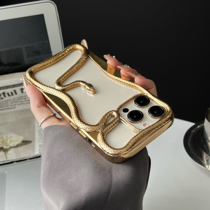 3d hollowed out เคสโทรศัพท์สีทองรูปงูสําหรับ iPhone 11 12 13 14 15 16 Pro Max Plus ปลอก Simple anti fall ปกอ่อนสําหรับ iPhone16Promax กรณี รูปที่ 1