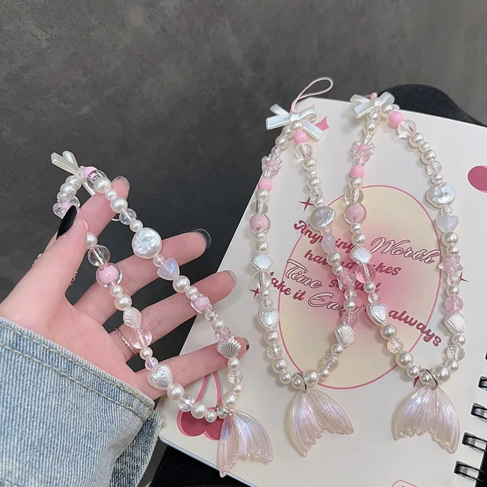 ห่วงโซ่โทรศัพท์ ins โซ่แขวนโทรศัพท์มือถือเกาหลี เชือกเส้นเล็กน่ารัก ดอกไข่มุกคริสตัล ห่วงโซ่ลูกปัดโทรศัพท์มือถื รูปที่ 1