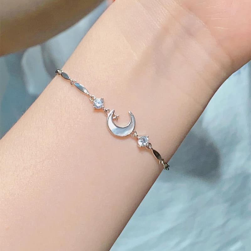 ในไทยสร้อยข้อมือโลหะผสมประดับโบว์ดอกไม้ดวงจันทร์พลอยเทียมแฟชั่นสําหรับผู้หญิงใหม่2024 รูปที่ 7