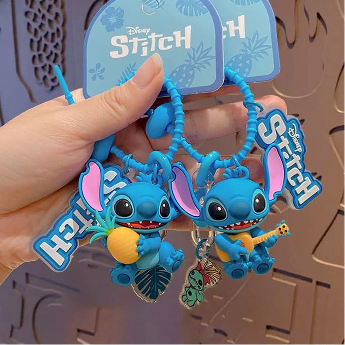 ของแท้ Star Treasure Stitch สับปะรดเพลงพวงกุญแจการ์ตูนอะนิเมะตุ๊กตากระเป๋านักเรียนจี้ของขวัญขนาดเล็ก รูปที่ 1