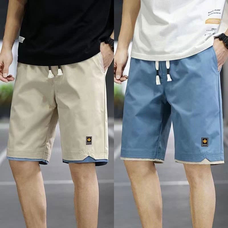 กางเกงขาสั้นแฟชั่นผู้ชายสีทึบ รูปที่ 5