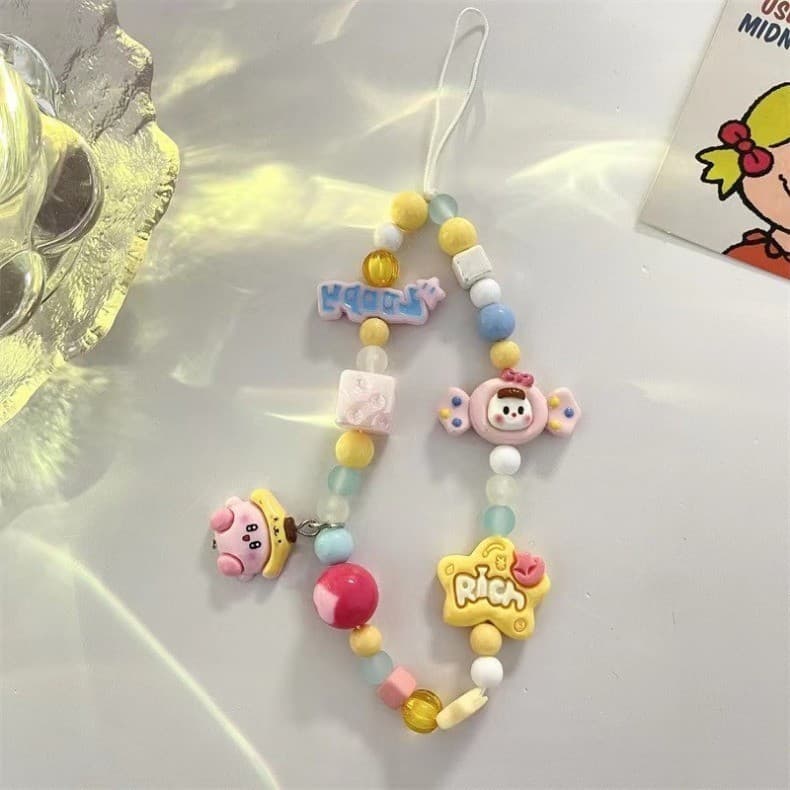 การ์ตูนน่ารักสร้อยข้อมือ 3D ตุ๊กตา SpongeBob SquarePants M เชือกถั่วพวงกุญแจหูฟังบลูทูธจี้เหมาะสําหรับโทรศัพท์มือถือทุกยี่ห้อและรุ่น รูปที่ 7