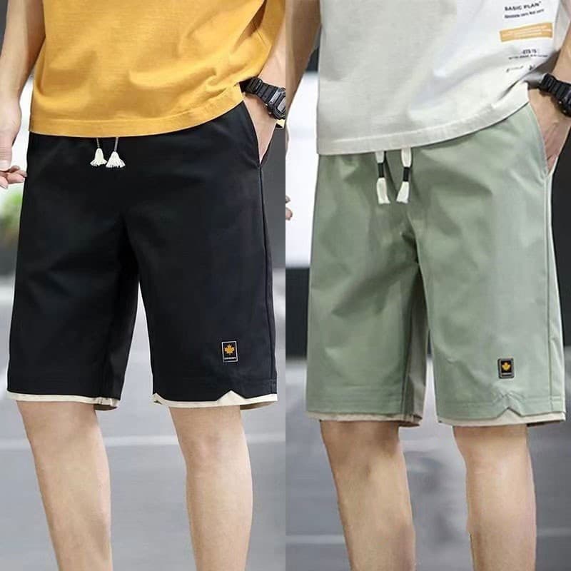 กางเกงขาสั้นแฟชั่นผู้ชายสีทึบ รูปที่ 2