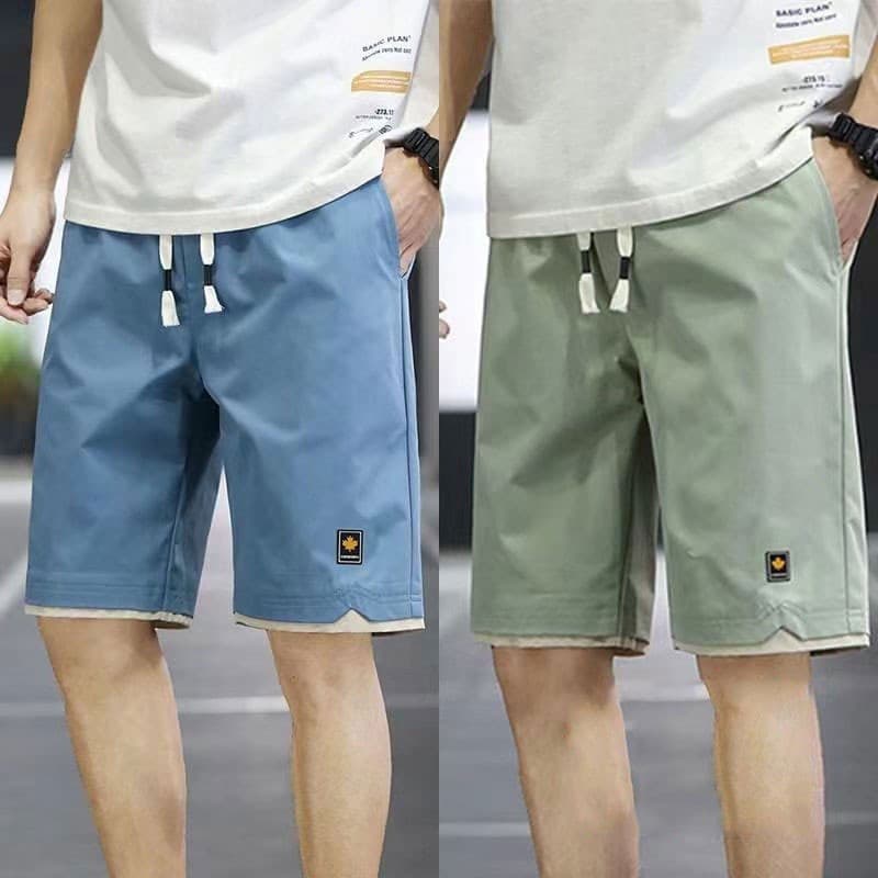 กางเกงขาสั้นแฟชั่นผู้ชายสีทึบ รูปที่ 4