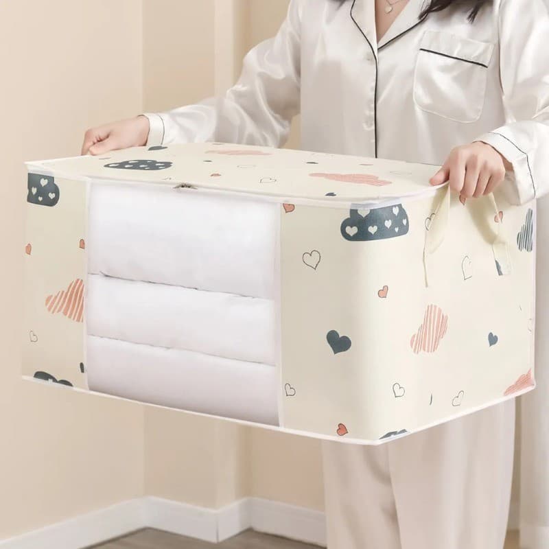 BUJOY กระเป๋าจัดเก็บเสื้อผ้า กระเป๋าเก็บเสื้อผ้าความจุขนาดใหญ่ 50/75L ใช้เก็บผ้านวม เสื้อผ้า จัดเก็บ อเนกประสงค์ รูปที่ 6