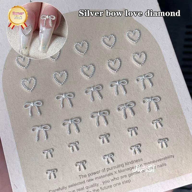 SuperNail 10pcs Alloy Bowknot Love Nails Art Charms ตกแต่ง 3D โลหะหรูหรา Silver Bows รูป Jewellery DIY เล็บออกแบบอุปกรณ์ Vary รูปที่ 1