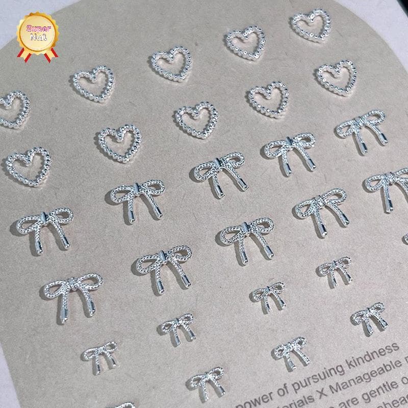 SuperNail 10pcs Alloy Bowknot Love Nails Art Charms ตกแต่ง 3D โลหะหรูหรา Silver Bows รูป Jewellery DIY เล็บออกแบบอุปกรณ์ Vary รูปที่ 3