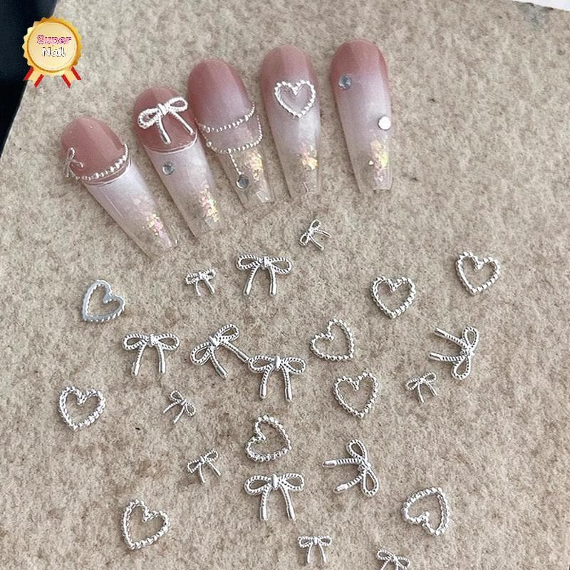 SuperNail 10pcs Alloy Bowknot Love Nails Art Charms ตกแต่ง 3D โลหะหรูหรา Silver Bows รูป Jewellery DIY เล็บออกแบบอุปกรณ์ Vary รูปที่ 2
