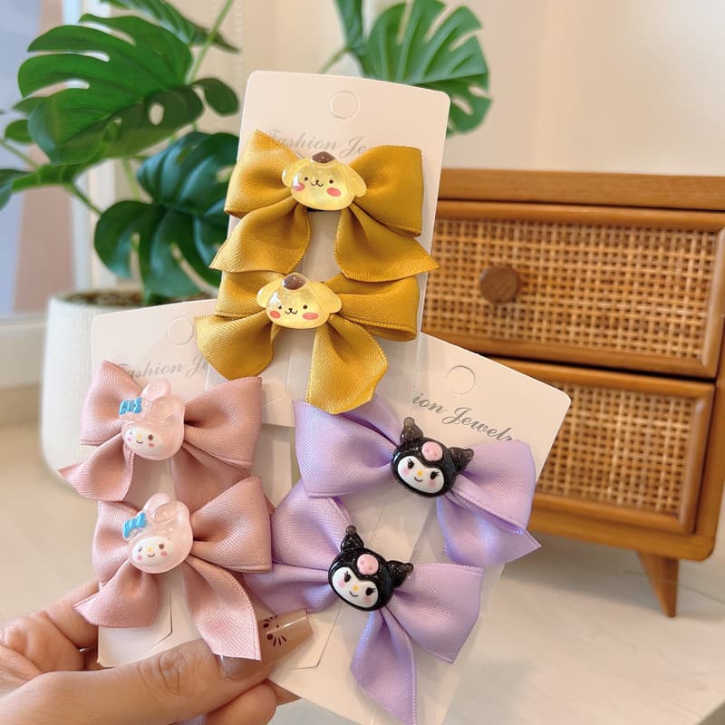 กิ๊บติดผมโบว์น่ารัก ชุด 2 ชิ้น เหมาะสำหรับเด็กผู้หญิง ตกแต่งด้วยลายการ์ตูนน่ารักๆ เป็นของขวัญที่ยอดเยี่ยม รูปที่ 2