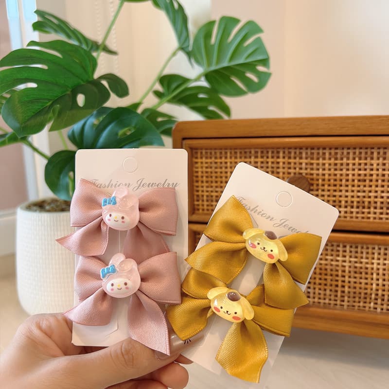 กิ๊บติดผมโบว์น่ารัก ชุด 2 ชิ้น เหมาะสำหรับเด็กผู้หญิง ตกแต่งด้วยลายการ์ตูนน่ารักๆ เป็นของขวัญที่ยอดเยี่ยม รูปที่ 4