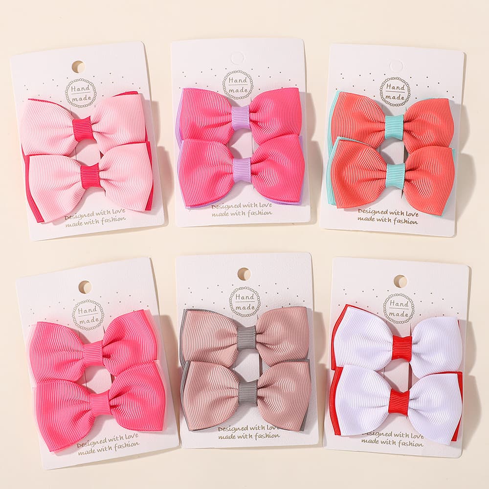 เซ็ต 2 ชิ้น Solid Bows กิ๊บติดผมสำหรับเด็กหญิง ทำจาก Grosgrain Ribbon พร้อมเสียบที่สวยงาม รูปที่ 1