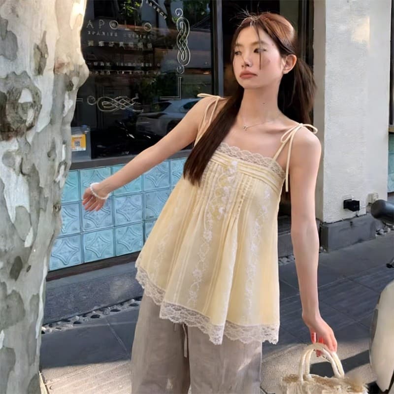 ZIRA เสื้อสายเดี่ยว สไตล์เกาหลี แฟชั่นสุดฮิต ผ้าปั้มนูนลายดอก งานลูกไม้เลส ลูกบานกระดุมหัวใจ ยางยืด น่ารัก รูปที่ 6