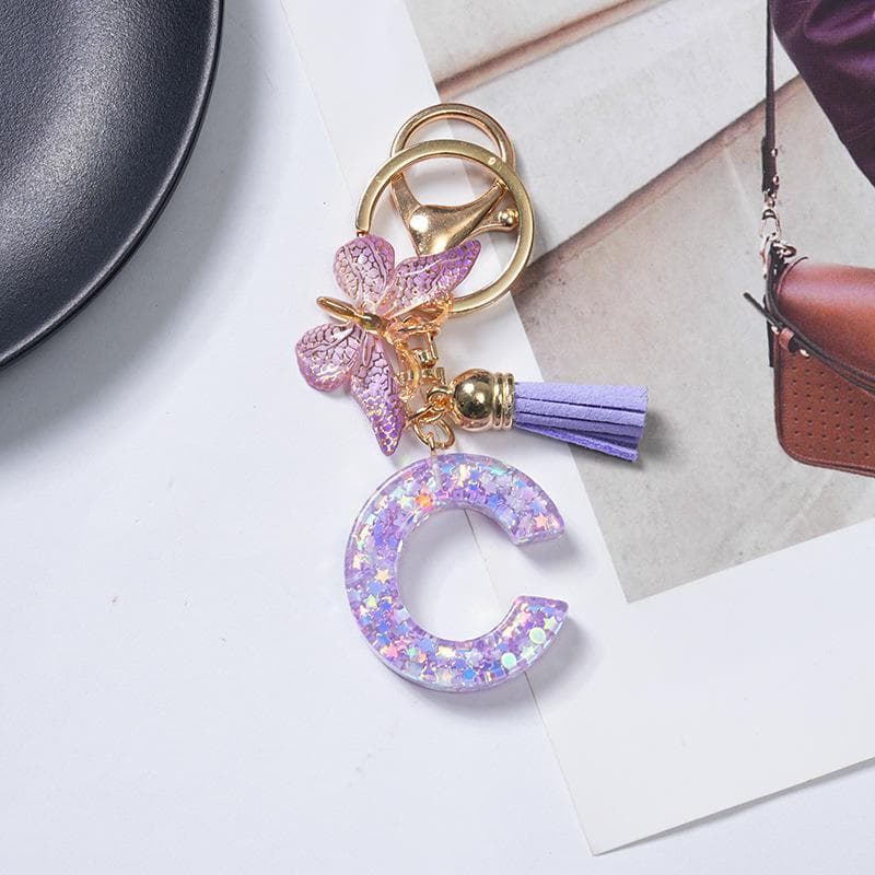 ลายดาวสีม่วง, อักษรย่อ 26 ตัว, จี้พู่ผีเสื้อ, พวงกุญแจ, ของตกแต่งกระเป๋า, อุปกรณ์ตกแต่งรถยนต์, ของขวัญ รูปที่ 9