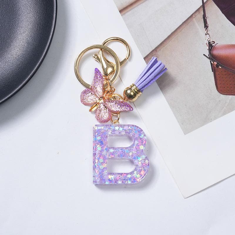 ลายดาวสีม่วง, อักษรย่อ 26 ตัว, จี้พู่ผีเสื้อ, พวงกุญแจ, ของตกแต่งกระเป๋า, อุปกรณ์ตกแต่งรถยนต์, ของขวัญ รูปที่ 8