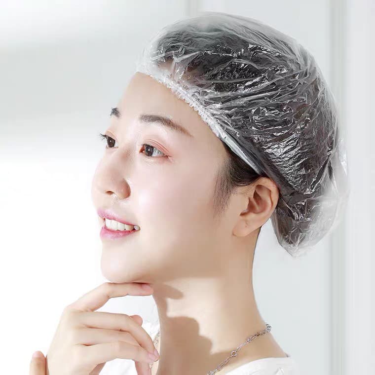 หมวกคลุมผมอาบน้ำแบบหนา อย่างดี สีใส 100 ชิ้น/แพ็ก แบบใช้แล้วทิ้ง