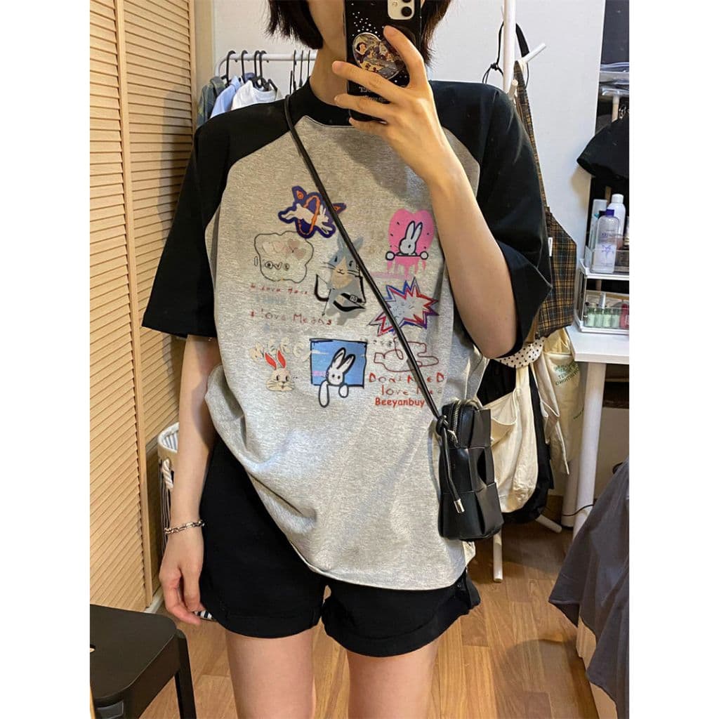 เสื้อยืดสวยๆผู้หญิงที่กําลังฮิต oversize เสื้อผ้าสไตล์ญี่ปุ่นน่ารัก แฟชั่นเกาหลี เสื้อโอเวอร์ไซส์วินเทจ สตรีทสีทูโทนม้าก รูปที่ 3