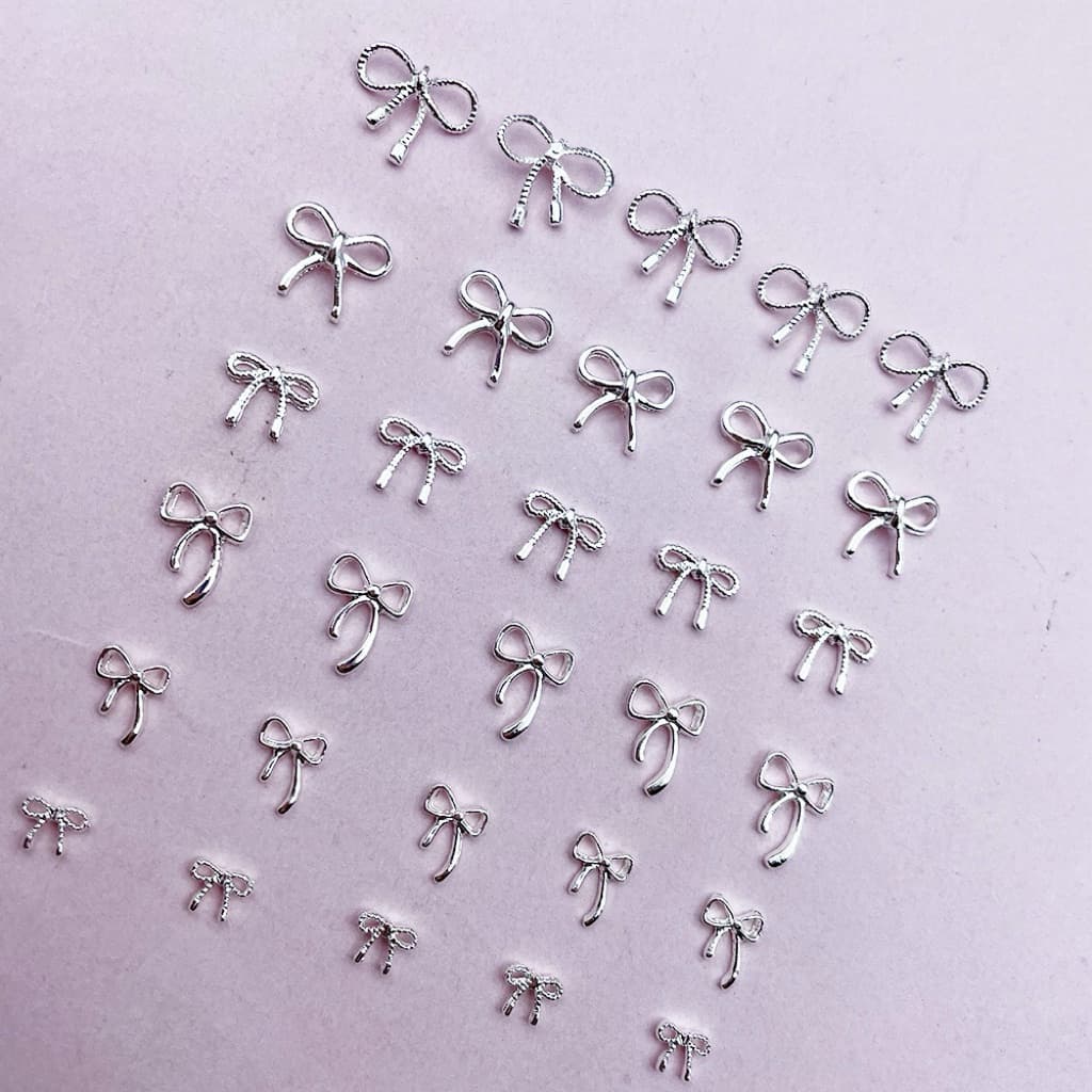 อะไหล่โบว์เงิน ตกแต่งหน้าเล็บ ติดของอเนกประสงค์ 10 ชิ้น/ห่อ สินค้า รูปที่ 2