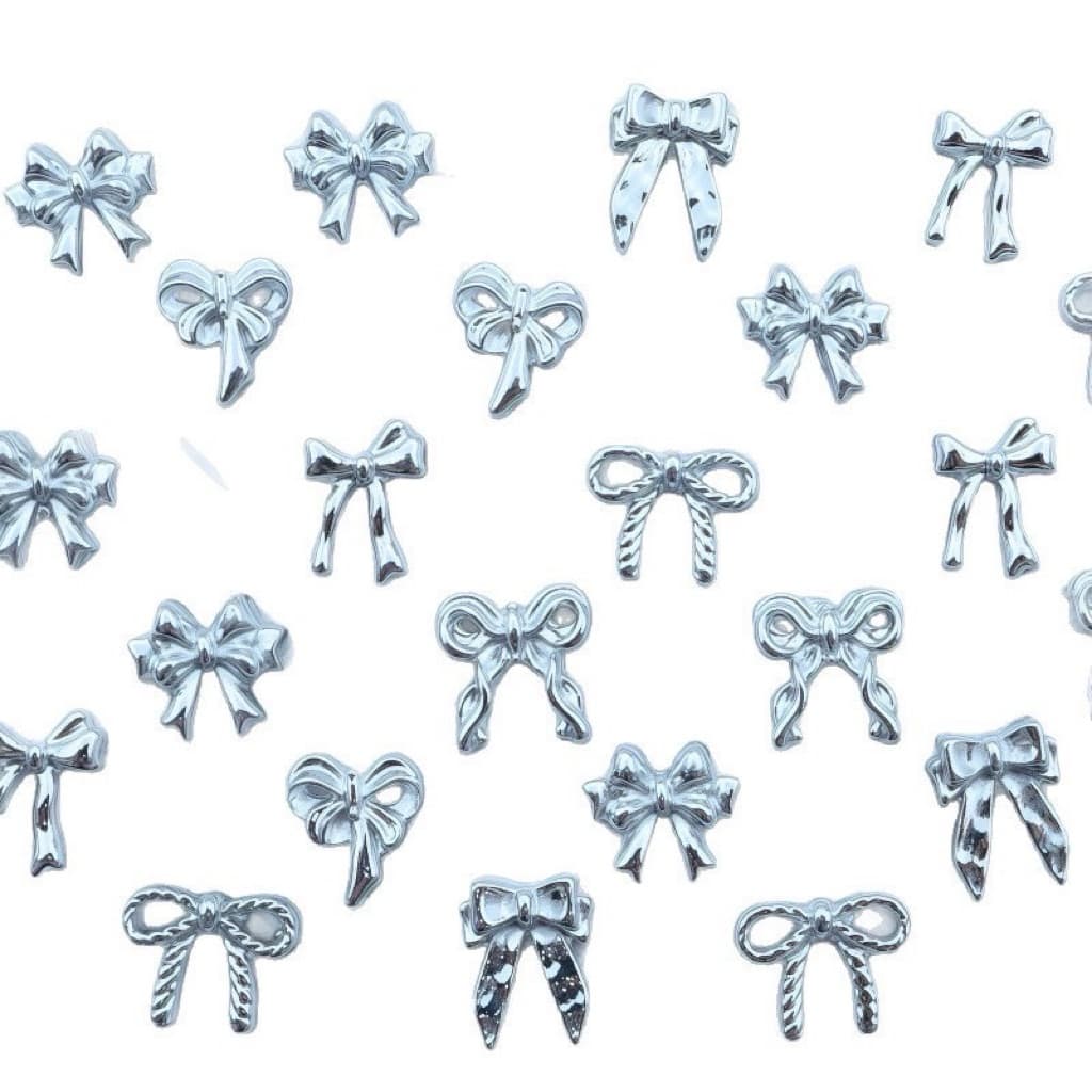 เรซิ่นโบว์สีเงิน สำหรับแต่งเล็บ 20ชิ้นต่อแพ็ค รูปที่ 4