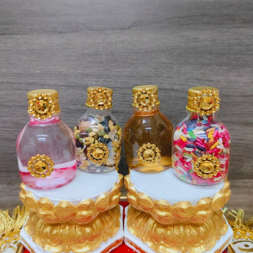 MT-PRY44 ชุดไหว้4ขวดจิ๋ว ถวายพระพิฆเนศ พระแม่ลักษมี เนยกีย์ น้ำผึ้ง ข้าว 9 สี ถั่ว 9 สี น้ำกุหลาบ รูปที่ 6