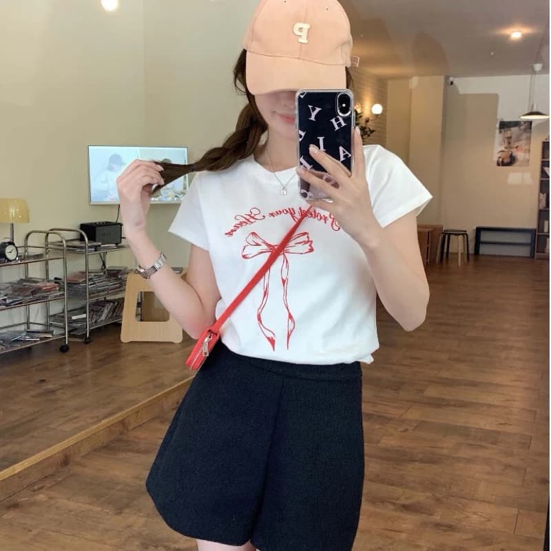 STR เสื้อยืดผู้หญิงสีขาว เสื้อรัดรูป เสื้อครอปแฟชั่นแขนสั้น พิมพ์ลายโบว์น่ารัก คอกลม สไตล์เกาหลี สาวอ้วนใส่ได้ รูปที่ 7