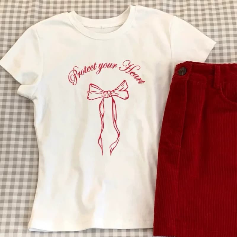 STR เสื้อยืดผู้หญิงสีขาว เสื้อรัดรูป เสื้อครอปแฟชั่นแขนสั้น พิมพ์ลายโบว์น่ารัก คอกลม สไตล์เกาหลี สาวอ้วนใส่ได้ รูปที่ 5
