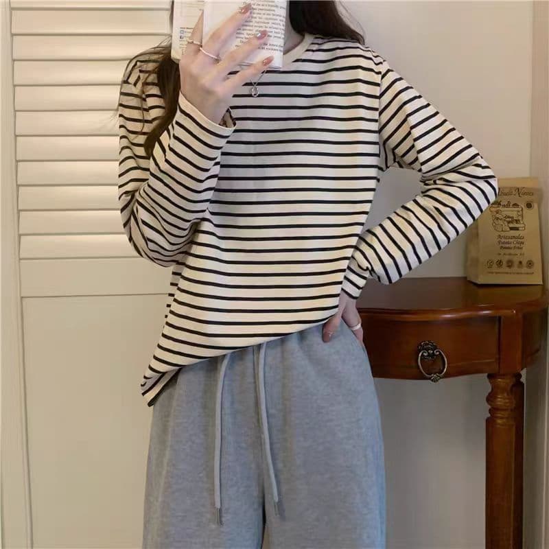 สินค้า เสื้อยืดคอกลม แขนยาว เสื้อยืดลำลอง ลายทางสไตล์เกาหลี ผ้าใส่สบายสำหรับผู้หญิง รูปที่ 9