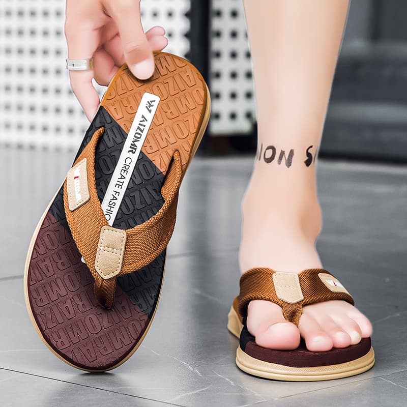 AIZOMR รองเท้าแตะหูหนีบ ชายหาด แฟชั่น รุ่นใหม่ ใส่สบาย ไม่ดีดน้ำ ผู้หญิงผู้ชายใส่ได้หมด เป็นของแท้จากโรงงาน 100% A2260 รูปที่ 2